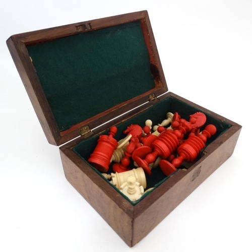 1185 - A carved and red stained bone Barleycorn Captain Cook style chess set in wooden box with mother of p... 