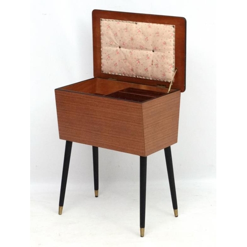 129 - Vintage Retro :   A mid century sewing table standing on 4 angled legs , opening to reveal a plush l... 