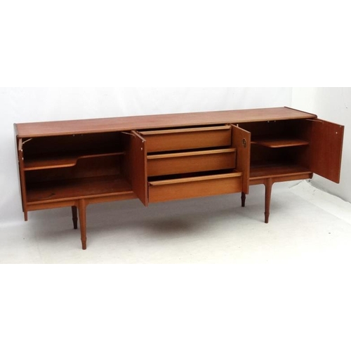 161 - Vintage Retro :    A British A H McIntosh & Co. Ltd., Kirkaldy  teak sideboard having three central ... 