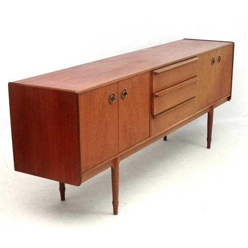 161 - Vintage Retro :    A British A H McIntosh & Co. Ltd., Kirkaldy  teak sideboard having three central ... 