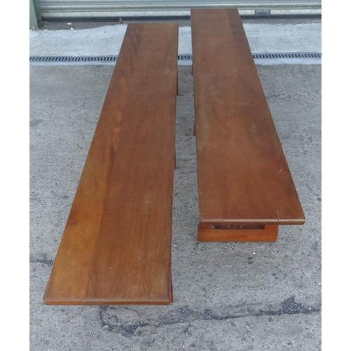 161A - A pair of mid century teak benches each with three stands , 8ft long x 16'' high x 14'' wide.