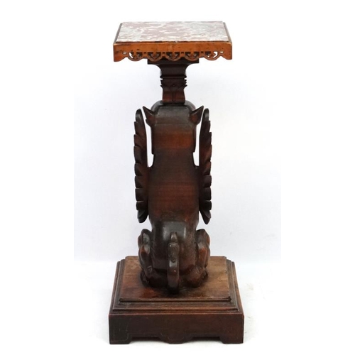 180 - A late 19thC rouge marble topped walnut console table with carved griffin column. The top 14 1/2'' s... 