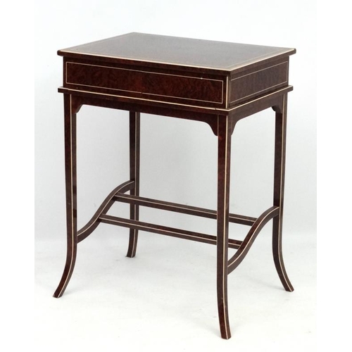 182 - Art Deco : A metamorphic amboyna writing table with strung and cross banded detail. In the manner of... 