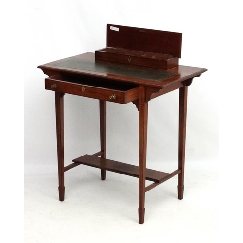 186 - Heel & Son London : A Rosewood ladies writing desk. Signed . 30'' wide x 17'' deep x 32 1/4'' high