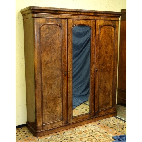 189 - A Victorian triple burr walnut wardrobe with central fitted section 80'' high x 72'' wide x 19'' dee... 