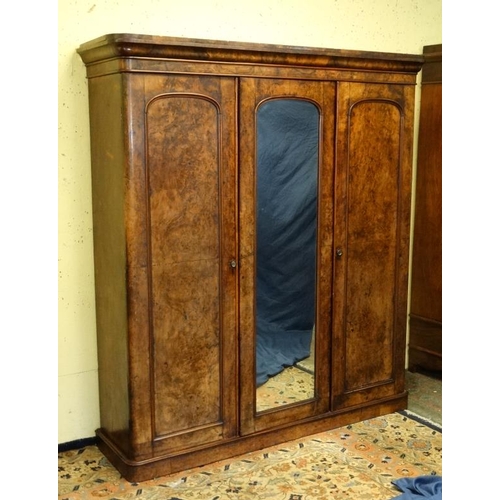 189 - A Victorian triple burr walnut wardrobe with central fitted section 80'' high x 72'' wide x 19'' dee... 