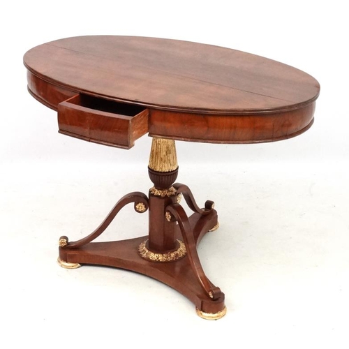 194 - A Biedemier fruit wood oval tripod table with central drawer. 40'' wide x 28'' deep x 31 1/4'' high