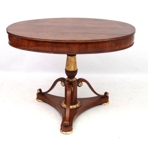 194 - A Biedemier fruit wood oval tripod table with central drawer. 40'' wide x 28'' deep x 31 1/4'' high