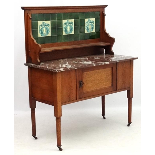 197 - A 19thC stained oak washstand with rouge marble top and tile back  42'' wide x 51'' high x 20 1/4'' ... 