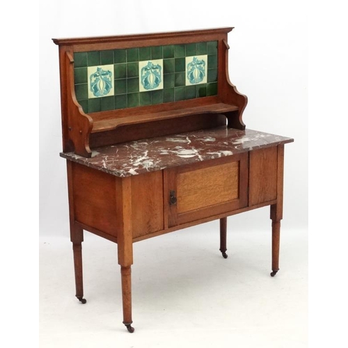 197 - A 19thC stained oak washstand with rouge marble top and tile back  42'' wide x 51'' high x 20 1/4'' ... 