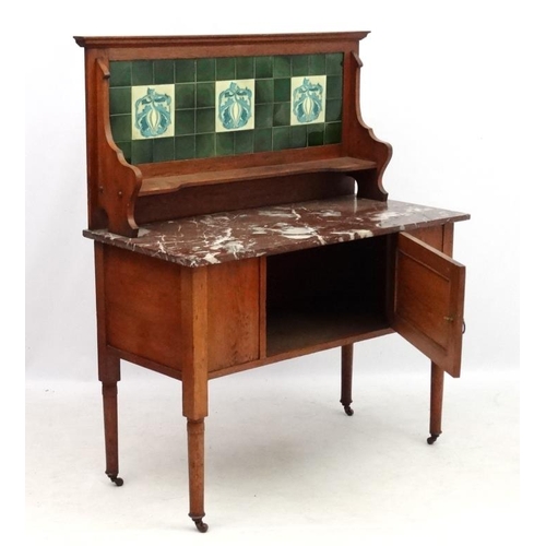 197 - A 19thC stained oak washstand with rouge marble top and tile back  42'' wide x 51'' high x 20 1/4'' ... 