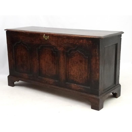 202 - An 18thC oak  three panel coffer with candle box 53'' wide  x 28 1/2 '' high x 19'' deep