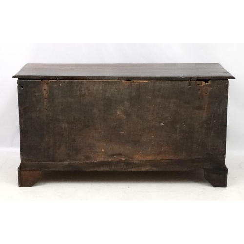 202 - An 18thC oak  three panel coffer with candle box 53'' wide  x 28 1/2 '' high x 19'' deep