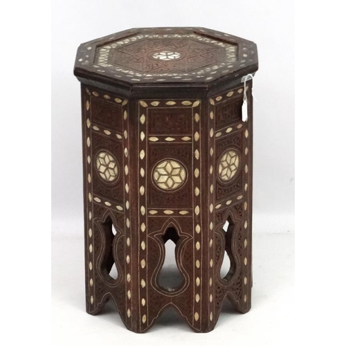 208 - An 18th/19thC Moorish (Islamic)  table of octagonal form with mother of pearl inlay. 13 1/4'' diamet... 