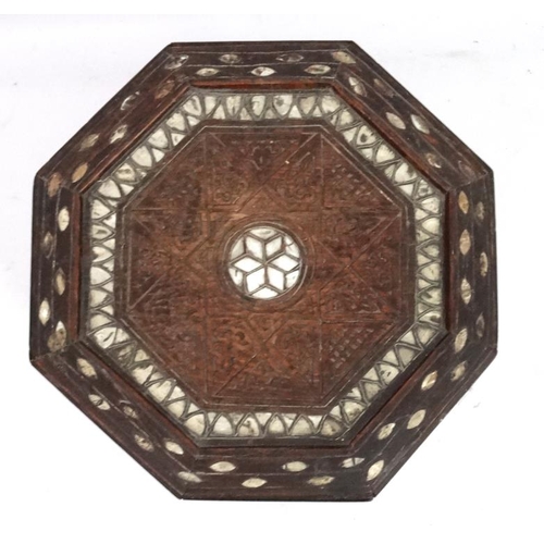 208 - An 18th/19thC Moorish (Islamic)  table of octagonal form with mother of pearl inlay. 13 1/4'' diamet... 