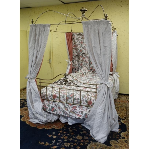 209 - A Victorian brass and steel four-poster bed with ornate crown like top. 55'' wide x  approx 96'' hig... 