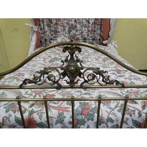 209 - A Victorian brass and steel four-poster bed with ornate crown like top. 55'' wide x  approx 96'' hig... 