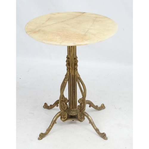 224 - Mid Century / Hollywood Regency :    A 1970's Onyx / marble  circular topped occasional table , with... 