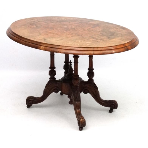 227 - A Victorian inlaid walnut oval tilt top centre table 45'' long x 34'' deep x 28'' high