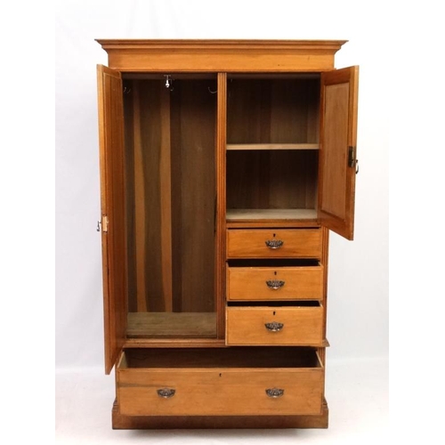 233 - A Victorian blonde walnut compactum style wardrobe 79 1/2'' high x 48'' wide