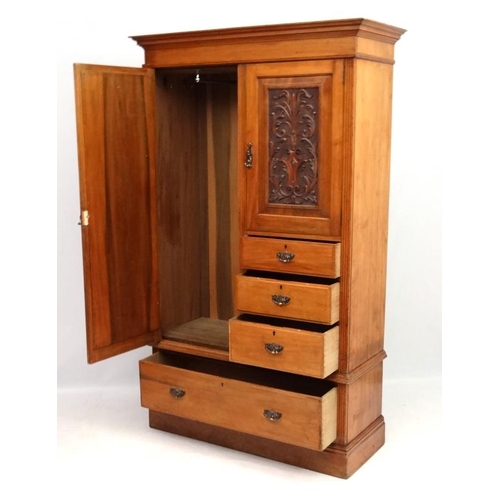 233 - A Victorian blonde walnut compactum style wardrobe 79 1/2'' high x 48'' wide