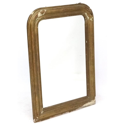 241 - A c.1900 moulded gilt frame bevelled edge wall mirror. 41 1/2'' high x 13 1/2'' wide