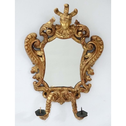 242 - A pair of 18 th / 19thC gilded carved wooden Italian Girandole mirrors each with twin branch candle ... 