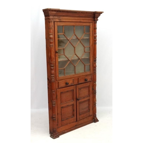 245 - A 19thC spruce pine glazed top corner cupboard with two cupboard doors and 2 faux drawers. 74 1/2'' ... 