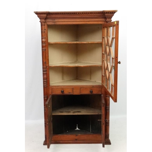 245 - A 19thC spruce pine glazed top corner cupboard with two cupboard doors and 2 faux drawers. 74 1/2'' ... 