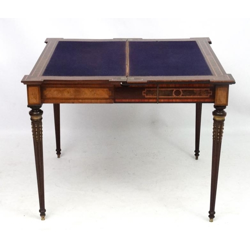 247 - A Louis XV French inlaid walnut card table with concertina action and ormolu mounts and walnut and b... 