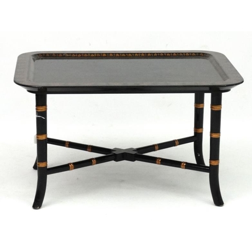 252 - A Regency style faux bamboo papier-mache coffee table with ebonised and gilt, lacquered detail 18'' ... 