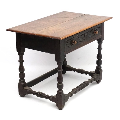 261 - An 18thC oak side table with frieze drawer ( having later carving) and turned baluster legs and supp... 