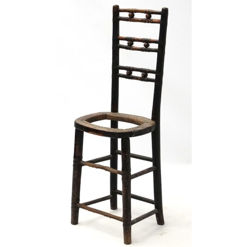 263 - A 19thC ebonised faux bamboo Mendlesham correctional chair 35'' high