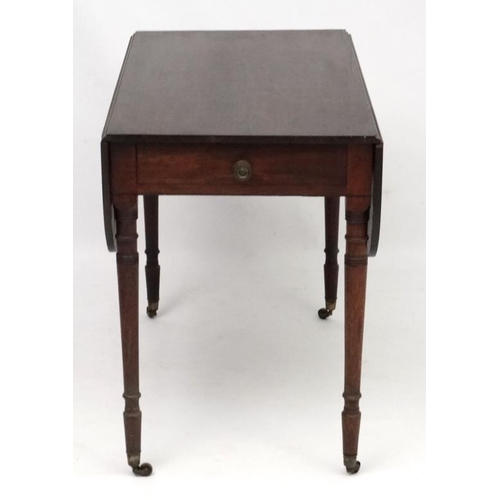 266 - A Geo IV mahogany Pembroke table with one true and one sham drawer. 35'' long