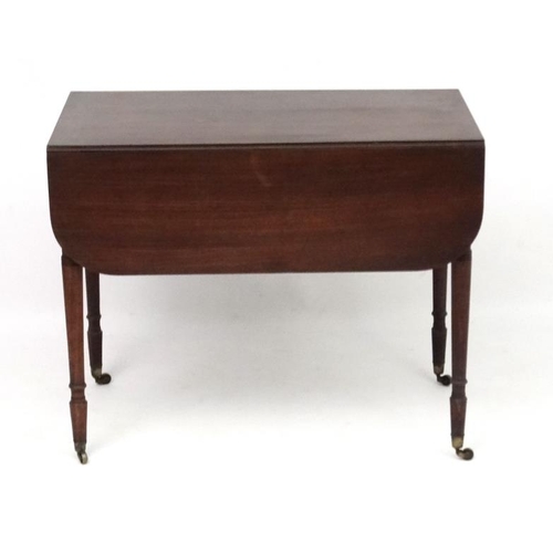 266 - A Geo IV mahogany Pembroke table with one true and one sham drawer. 35'' long