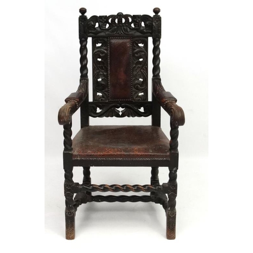 269 - A William and Mary Revival oak chair with embossed leather seat, pack splat and arm pads  leather an... 