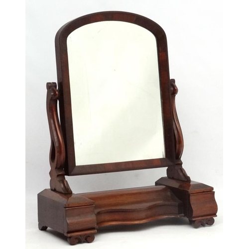 271 - A Victorian mahogany large toilet mirror with central compartment flanked by drawers.  34'' high 26'... 