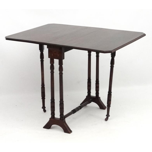 277 - A late 19thC mahogany Sutherland table of 4 legs with twin turned supports to ends and single stretc... 