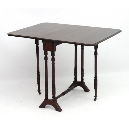 277 - A late 19thC mahogany Sutherland table of 4 legs with twin turned supports to ends and single stretc... 