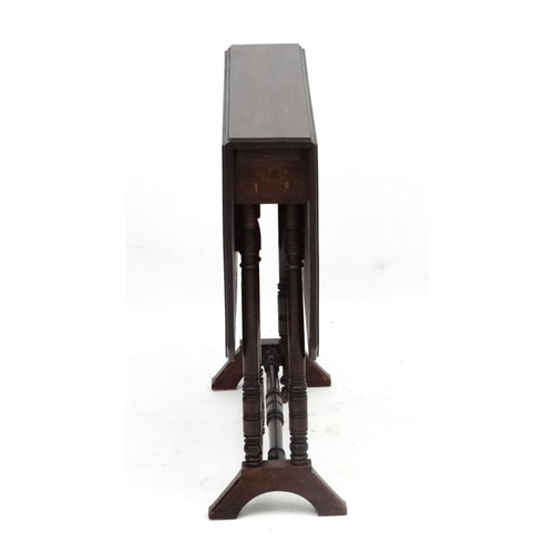 277 - A late 19thC mahogany Sutherland table of 4 legs with twin turned supports to ends and single stretc... 