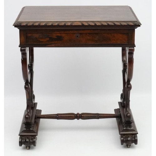 278 - A Regency rosewood games table with fold over top 25 3/4'' wide