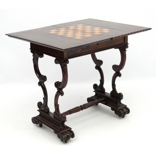 278 - A Regency rosewood games table with fold over top 25 3/4'' wide