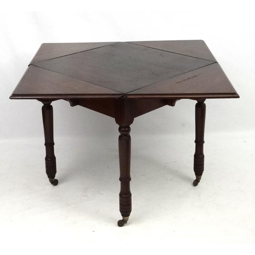 283 - A late 19thC walnut drop flap table with triangular shaped drop flap sections 29 1/2'' sq. x 30'' hi... 