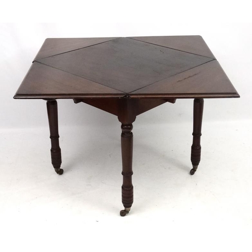 283 - A late 19thC walnut drop flap table with triangular shaped drop flap sections 29 1/2'' sq. x 30'' hi... 