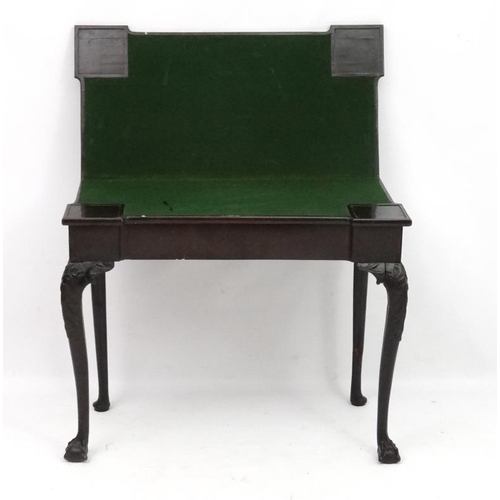 288 - A fine early - mid 18thC mahogany fold over cartable with pad feet and ball and claw cabriole legs, ... 