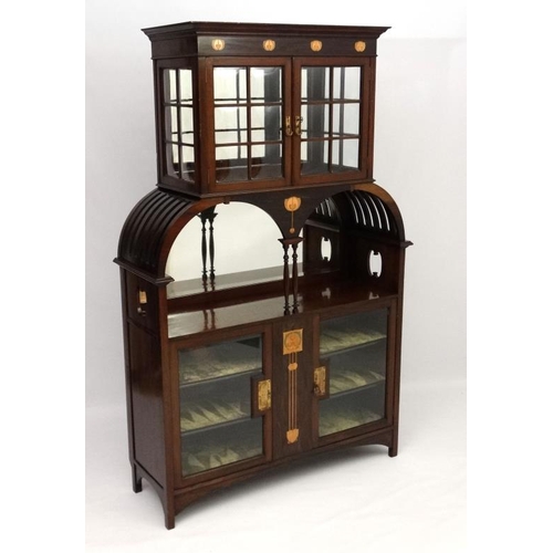 290 - Art Nouveau : An inlaid mahogany cabinet with copper  tulip wood and blonde wood inlay etc. Understo... 