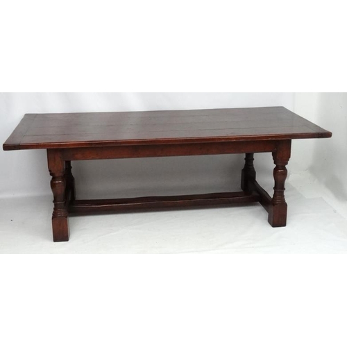 295 - A large oak 4-plank dining table in the 17thC style Refectory table with baluster turned legs and pe... 