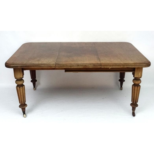 298 - A c.1860 extending mahogany dining table with four gadrooned legs 40 3/4'' wide x 62 1/2'' ( extende... 