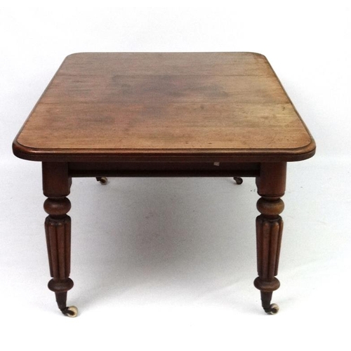 298 - A c.1860 extending mahogany dining table with four gadrooned legs 40 3/4'' wide x 62 1/2'' ( extende... 