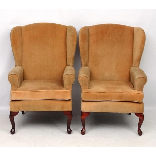 302 - A pair of Victorian style wing back arm chairs 42'' high